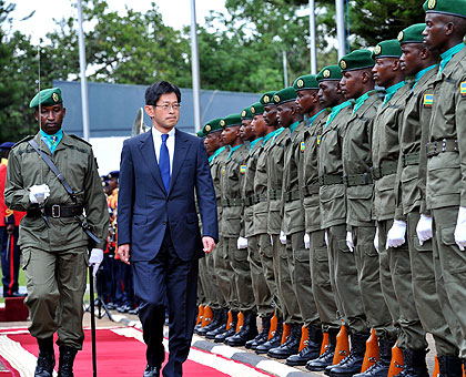 Amb. Kazuya inspects a guard of honour before presenting his credentials to President Kagame. He said Rwanda, as one of the fastest developing African countries has much to share at the summit.  The New Times/Village Urugwiro. 