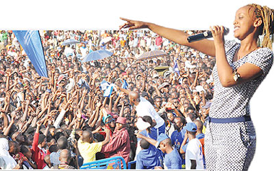 Senderi joins the excited Nyanza crowd at the event. Can you hear me, Knowless seems to ask