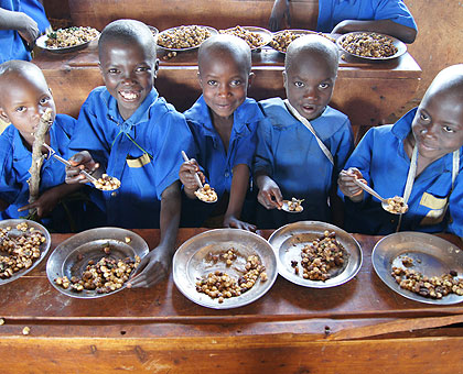 Plans are underway to have the school feeding programme introduced in all schools across the country. The New Times/File.