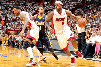 After imploring the Heat to play better, LeBron James scored 19 in the second-half of Miami's victory. Net photo.