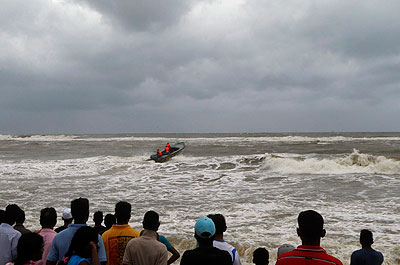 Naval boats and helicopters scoured seas off Sri Lanka on Monday for dozens of people still missing. Net photo.