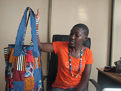 Umuraza displays a locally made bag. She challenges business people to invest in different concepts of packaging, but just paper bags to take advantage of the East Africa market.  The New Times / Peterson tumwebaze