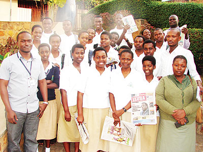 Students pose for a photo with their teachers and The New Timesu2019 journalists. The New Times / Niyigena Faustin.