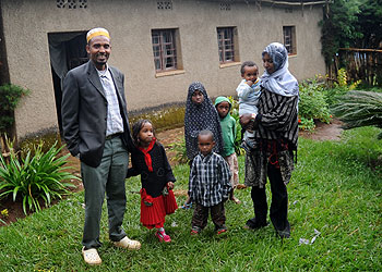 Tumukuze with his family after returning from Pakistan in January. The New Times/File