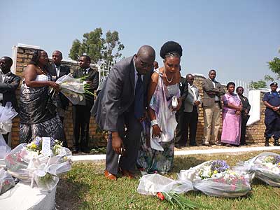 Mourners pay respect to victims of the 1994 Genocide against the Tutsi buried at Kavumu memorial site in Nyanza District.  The New Times/ Jean Pierre Bucyensenge