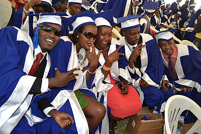 A cross section of the graduates celebrate yesterday. The New Times/ J Mbonyinshuti. 