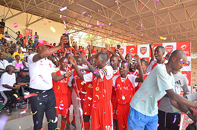 Lionceaux Academy players celebrate after winning the trophy.  The New Times / Courtesy.