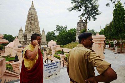 Pilgrims visit the site believed to contain the tree under which the Buddha reached enlightenment . Net photo.