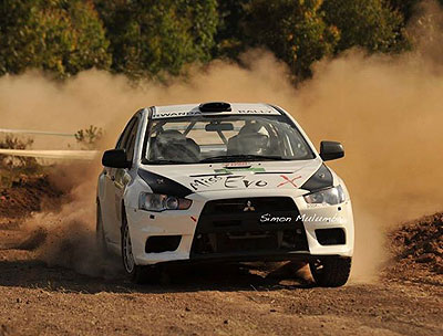 Giancarlo Davite and Slyvia Vindevogel cruising their Mistubishi Evo X in a past African Rally Championship round. Davite has to bounce back and win the remaining rounds in order to realise his chance of winning his first ARC crown this year.  The New Times / B. Mugabe.