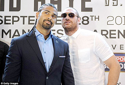 Head to head- David Haye and Tyson Fury come face to face to announce their heavyweight fight in September.  Net photo.