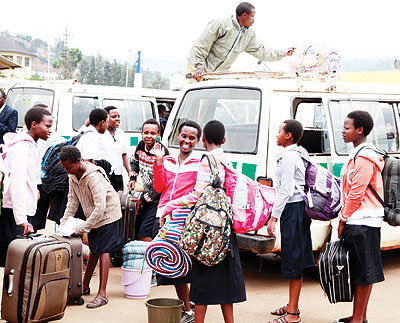 Students boarding taxis to return to school. The New Times/ Timothy Kisambira