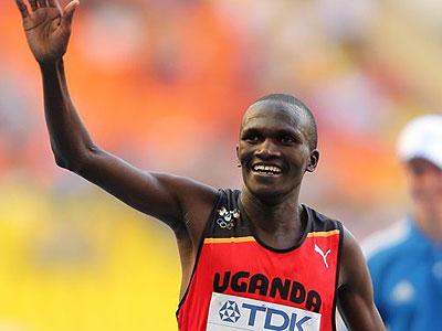 Stephen Kiprotich of Uganda crosses the line to win gold in the Men's Marathon on Saturday, while Jean Pierre Mvuyekure did not finish. Net photo.