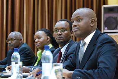 (Lu2013R): RSA boss Binamungu, Monyatsi, Hategeka and Serge Guillaume, an advisor to the youth, sports and culture minister, listen to discussions at the workshop. The New Times / Timoth....