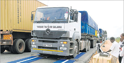 A cargo truck at a weighbridge. The roads agency is to reintroduce the bridges to check overloading of trucks. The New Times / File photo