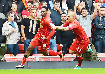 Liverpool's Daniel Sturridge (left) and Martin Skrtel celebrate at Anfield stadium in Liverpool on September 1, 2013. Net photo.