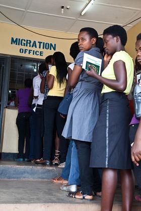 People queue at immigration office. The integration process will ease movement of people across the bloc. The New Times/ File.