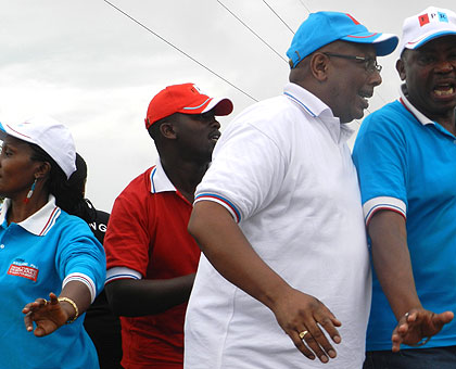 Rukumbura (in white t-shirt) and other party candidates at a rally. The New Times/ Rwembeho