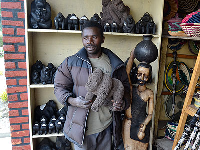 Leonidas Hatumimana stands in a display room for art products their cooperative members make. The New Times/Jean du2019Amour Mbonyinshuti