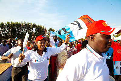 RPF-Inkotanyi supporters (above) jubilate at a rally in Masaka Sector in Kicukiro District on Wednesday. Below, the coalition parliamentary candidates campaign.  The New Times/ Tim....