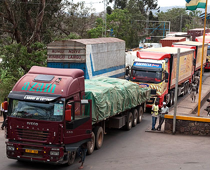 Trucks at the Rusumo border post. A reduction of $348 will have a huge impact on Rwandan business, according to experts. The New Times/Timothy Kisambira