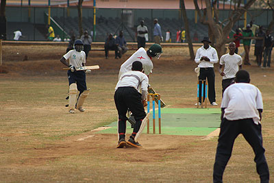 Kagarama SS batsman Brian Bugingo (back to camera), seen here batting during this year's Schools Cricket Week, is one of the key players for Rwanda. Saturday Sport / File.