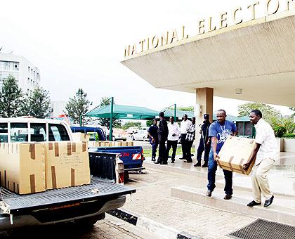 Electoral Commission officials load election materials onto a pick-up truck on Friday as NEC geared up for tomorrowu2019s polls. Sunday Times/John Mbanda