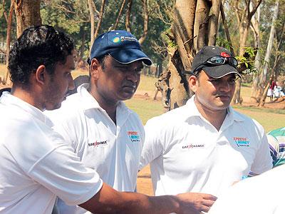 Challenger's players discussing the next move during a previous match. Sunday Sport/Courtesy