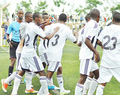 APR players celebrate the opening goal scored by Albert Ngabo (3) yesterday at Stade de Kigali.  The New Times / Plaisir Muzogeye.