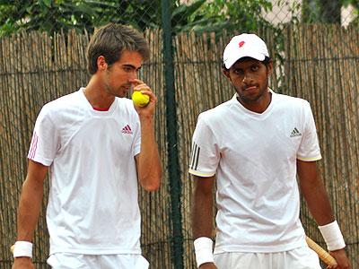 Gerard Melzer (L) won the singles title before teaming up his compatriot Lukas Jastruanig (R) to win the doubles title. Sunday Sport/Plaisir Muzogeye