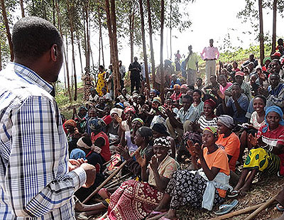 Francis Sebagabo, the executive secretary of Karama Sector in Kamonyi District addresses some of the VUP beneficiaries last week. The New Times/File. 