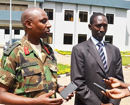 Col. Jill Rutaremara, the Director of RPA and Major General (Rtd) Cyrille Ndayirukiye, the Director of Eastern African Standby Force Coordination Mechanism addressing media after s....