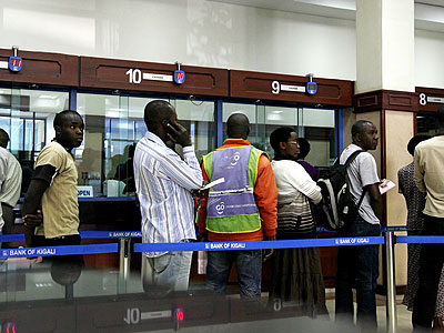 Clients on the queue waiting to be served in a bank. The New Times/File