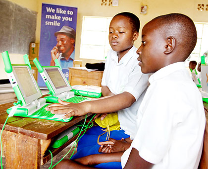 Pupils of Kimisagara Primary School use laptops. The New Times/ T. Kisambira.