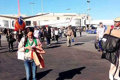 Hundreds of travelers could be seen streaming away from at least one terminal building. Net photo.