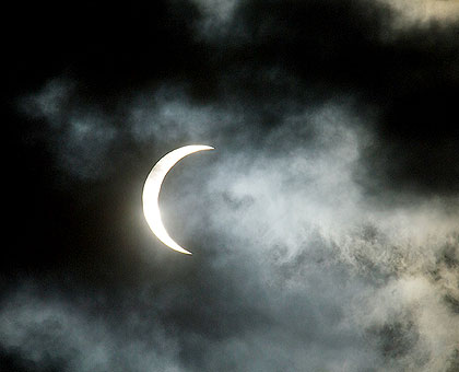 SPECTACULAR: The moon shadows the sun as seen from Mont Kigali yesterday.The New Times/ Gael Ruboneka. 