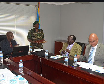 L-R: Ruzindana Major Chantal Ujeneza, Dr Geoffrey Njeru and his colleague, only identified as David during the visit at Rwanda Peace Academy.   The New Times/Jean du2019Amour Mbonyinshuti