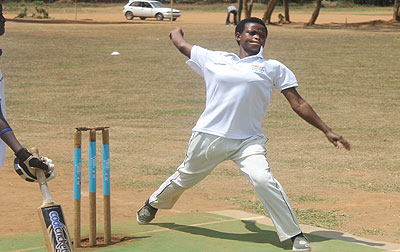 Egidia Uwimana of Kigali Angels, seen here bowling in a previous match, will lead her team's attack against White Clouds on Saturday morning. Saturday Sport / File.