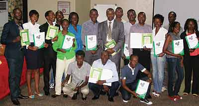 EQUIPPED: Some of the trainees display their certificates.  The New Times / Peterson Tumwebaze