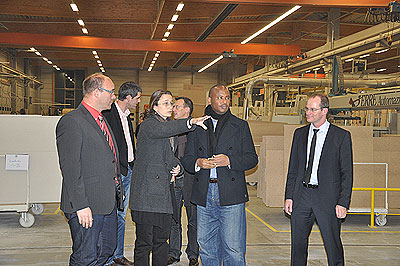 Nsengiyumva (R) during a guided tour of  FingerHausu2019 production lane in Hesse, Germany. The New Times/Courtesy. The New Times/ Courtesy .