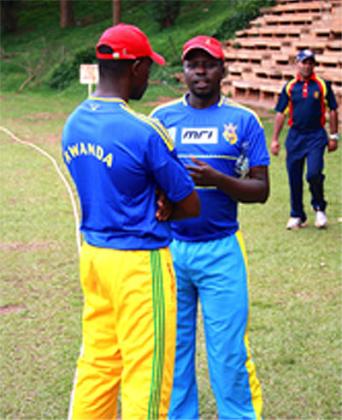 Right Guards'  duo Joshua Mwanja (R) and Eric Dusingizemungu exchange ideas during a previous game. Saturday Sport / Courtsey.