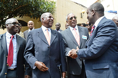 (L-R) New Vision Uganda  Chief Executive Officer, Robert Kabushenga,  former  EAC Secretary General, Amanya Mushega, former Kampala Central MP Captain Francis Babu and EAC Secretary General, Amb. Dr. Richard Sezibera share a moment after the opening session of the Media Summit. The New Times/ Courtesy.