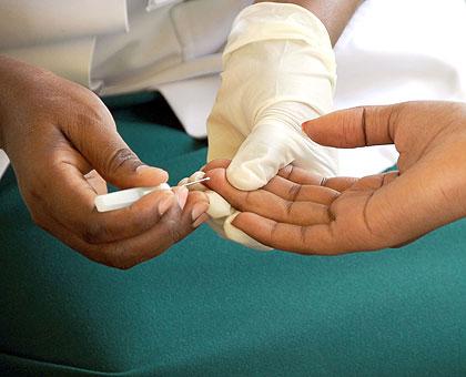 A volunteer testing for HIV. The New Times/Timothy Kisambira