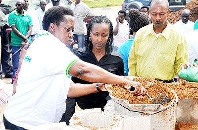 Kirabo, then mayor of the City of Kigali, leads a city beautification campaign in 2010.    The New Times/ File.