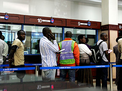 Customers queuing in Bank of Kigali for service. The New Times/Timothy Kisambira