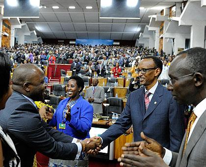 President Kagame greeting some of the participants during the Dialogue. The New Times/Village Urugwiro