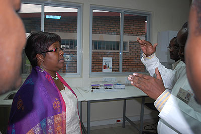 BInagwaho listens to Dr Gahutu (R) during visit at CHUB on Wednesday. The New Times/ Bucyensenge.