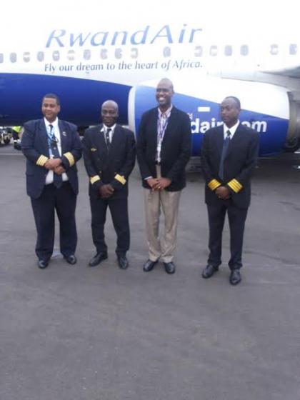 CLOCKWISE: Capt. Santos Pio, Director of Flight Operations, RwandAiru2019s Chief Pilot Capt. Marcel Gabou Tirefort, RwandAiru2019s CEO John Mirenge and the newly promoted Capt. Bosco Murabukirwa. The New Times/Courtsey