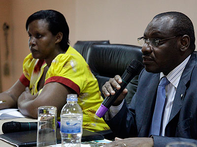 Finance Minister Claver Gatete (R) with Gender and Family Promotion Minister Oda Gasinzigwa at the launch of the National Financial Education Strategy on Wednesday. The New Times/John Mbanda