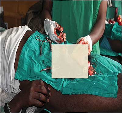A youth undergoing circumcision. The New Times/  Timothy Kisambira.