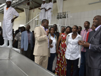 Minister Kalibata and other officials being briefed at the facility. The New Times/Jean d'Amour Mbonyinshuti